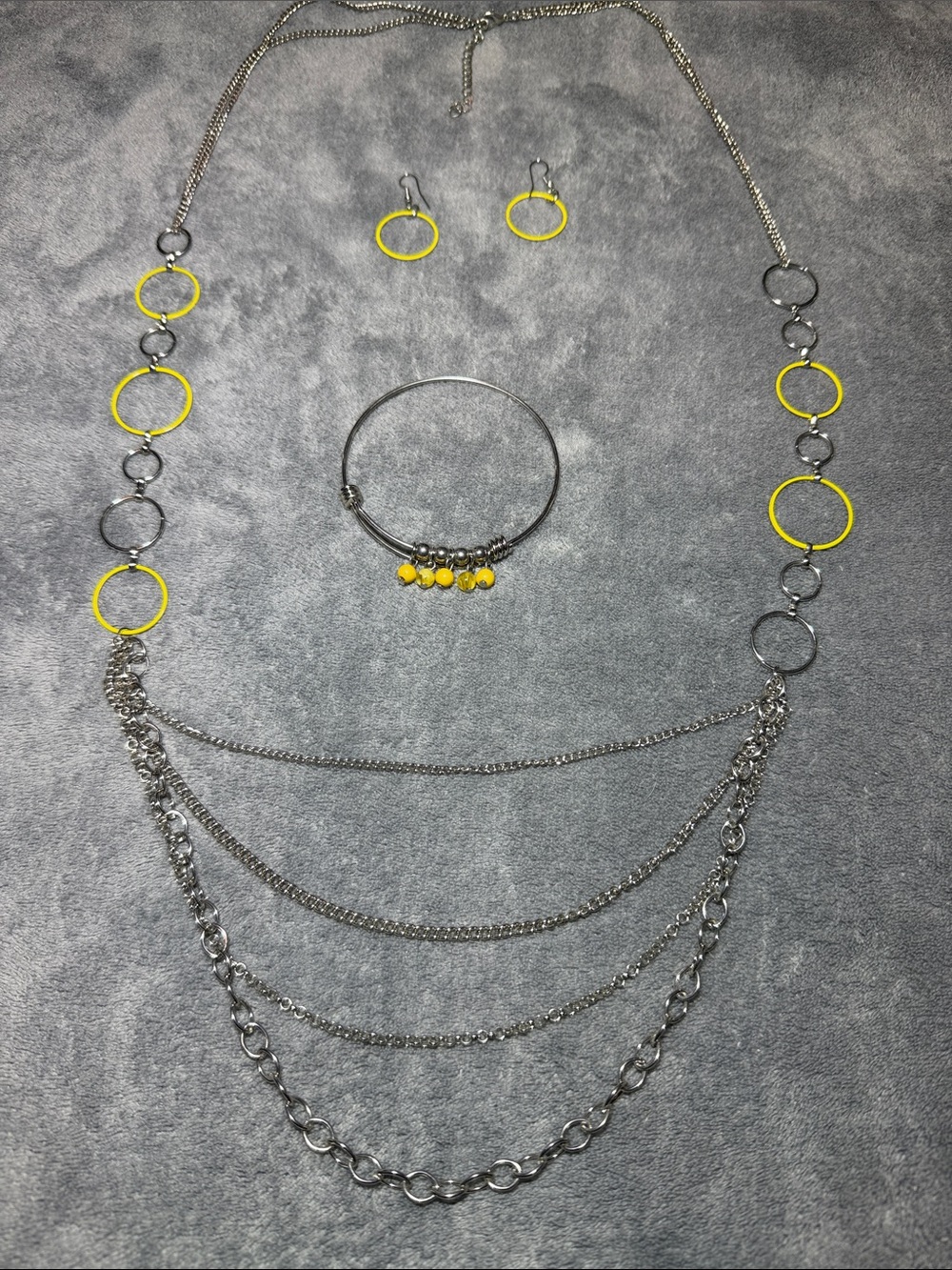 Silver Multi-Layer Necklace Set with Yellow Accent Earrings and Bracelet